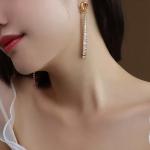 Boucle d'oreille longue en plaqué or 18k